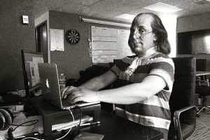 Ben Franklin at his Macbook Air