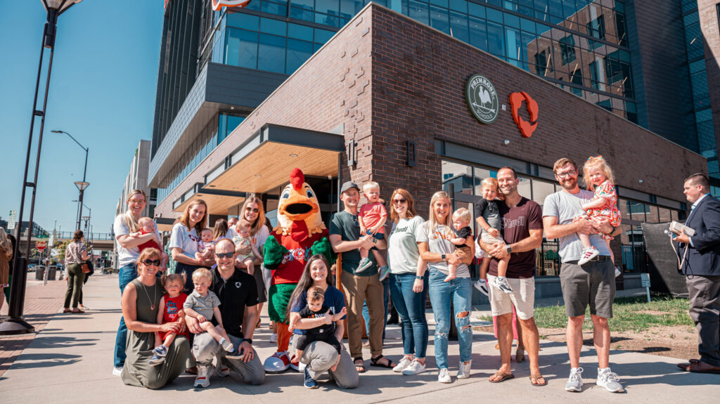 A group of Primrose parents celebrate the opening of the Primrose School at Hudl in Lincoln.