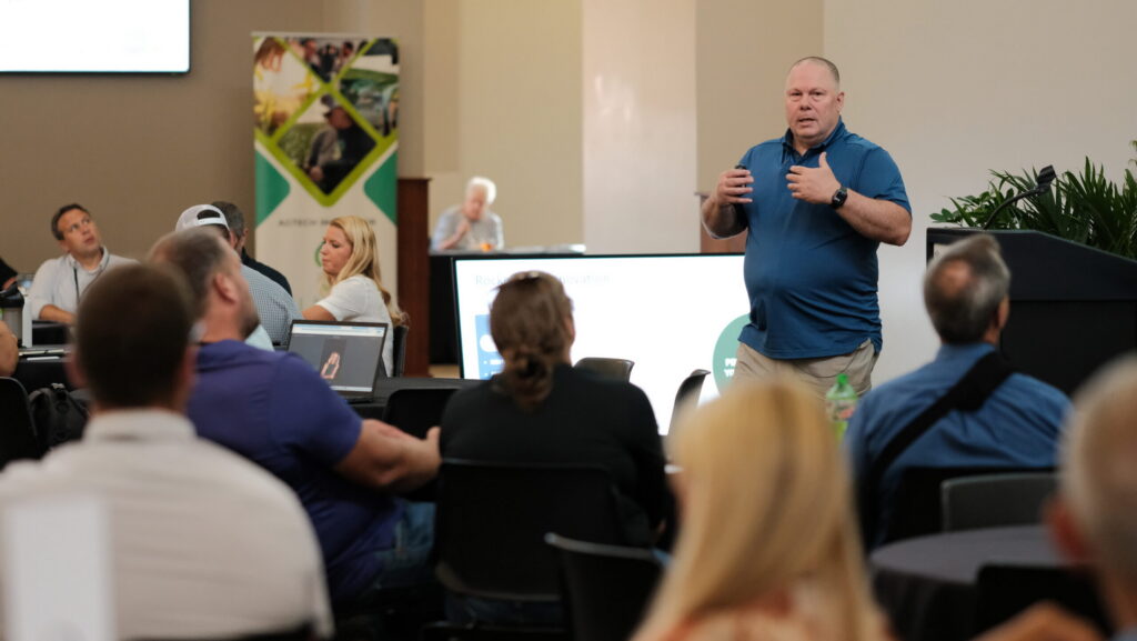 Grain Weevil Co-founder and CEO Chad Johnson leads a keynote presentation during AgTech Connect 2026