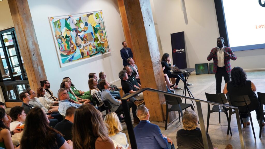 Co-founder and CEO Emma Olorunsheyi presents at the NMotion Spring 2025 Showcase at Millwork Commons in Omaha