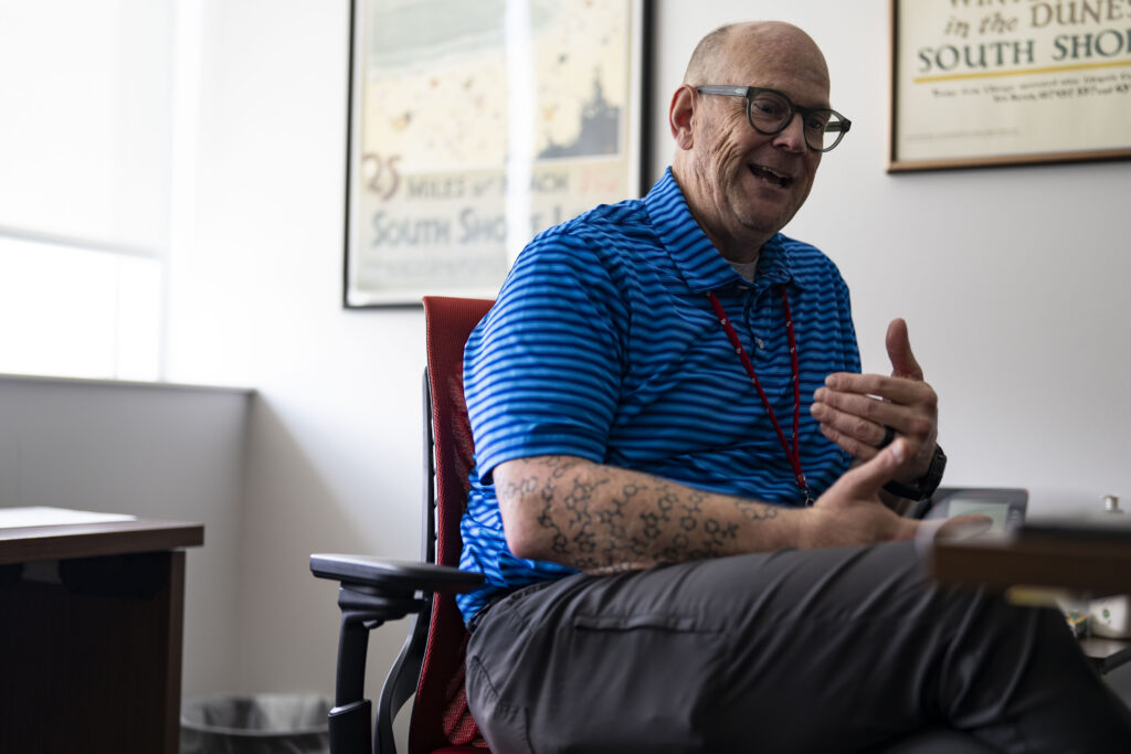 Corey Hopkins, director of the UNMC Center for Drug Design and Innovation, speaks in his office about the 11h drug’s promise for treatment of brain-related diseases. Hopkins is the inventor of 11h.
